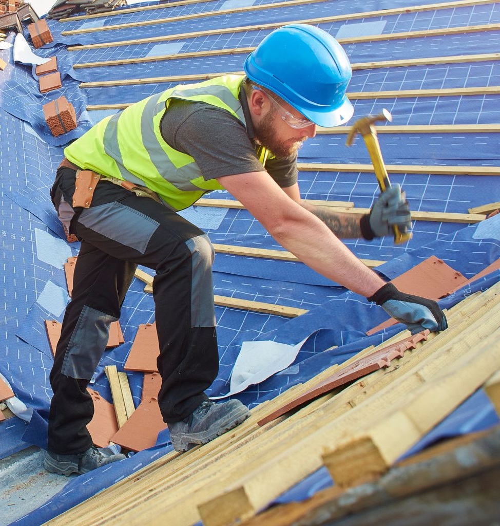 Man Replacing Roof