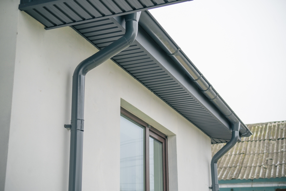 Closeup view of a nice and perfect downspout installation
